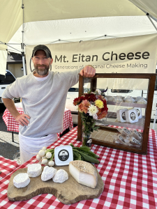 cheesemaker with goat cheese