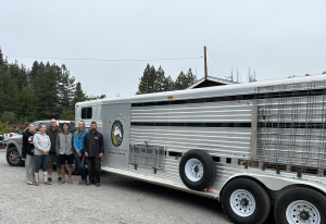 Farm team with livestock trailer